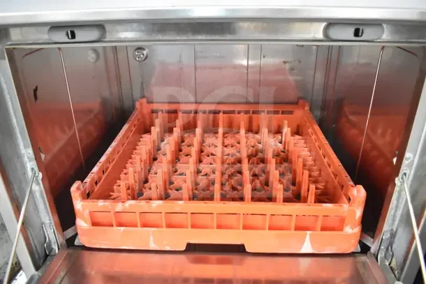 Fagor DJ AD-64 CW commercial undercounter dishwasher, interior view with orange dish rack, 230 volts, 1 phase.