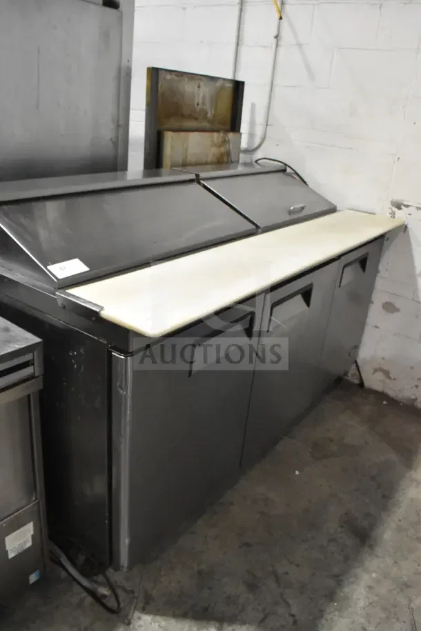 2018 Atosa MSF8304GR commercial sandwich prep table with cutting board, on casters, 115V, 1 phase, stainless steel, used condition.