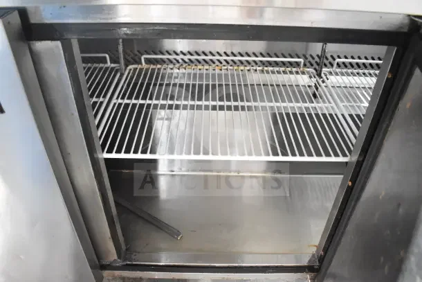 2018 Atosa MSF8304GR commercial sandwich salad prep table with shelves and stainless interior, on commercial casters. 115V, 1 Phase.