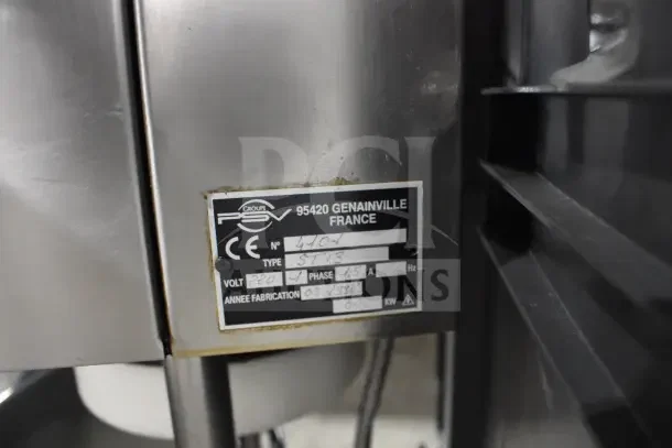 PSV Groupe ST13 Automatic Filling Machine, 220V, 1 Phase, stainless steel, visible label showing model and voltage details.