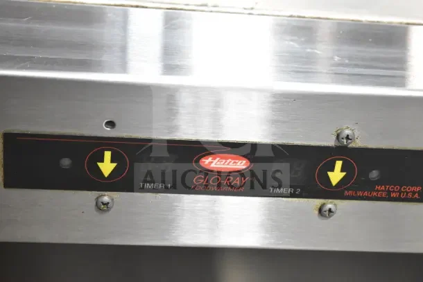 Hatco Glo-Ray Commercial Countertop Heated Holding Merchandiser, stainless steel, with digital timers and Hatco logo.