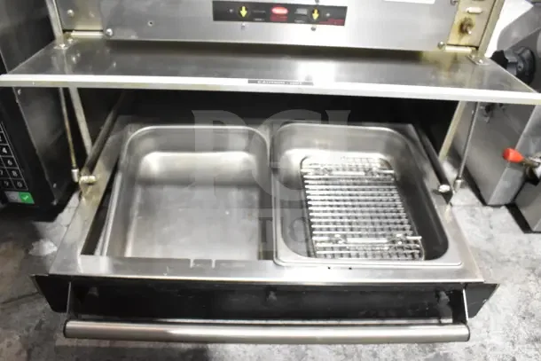 Hatco Commercial Countertop Heated Holding Merchandiser, dual stainless steel pans, used condition, with control panel.