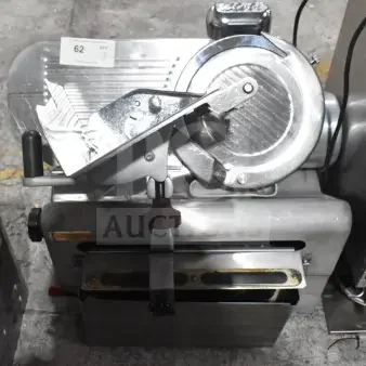 Globe 775L commercial automatic meat slicer with blade sharpener, stainless steel, 115V, good condition, label number 62 visible.