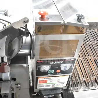 Bunn G9-2T DBC commercial coffee grinder, stainless steel, 120 volts, visible controls, used condition.