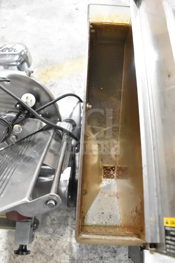 Bunn G9-2T DBC coffee grinder, 120V, 1 Phase, shows wear in hopper.