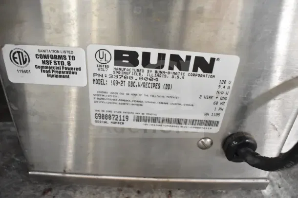 Bunn G9-2T DBC coffee grinder label showing model, serial number, 120V power details, and NSF conformity.