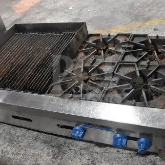 Prince Castle FHP48-2RB commercial charbroiler, natural gas, 4 burners, well-used condition, blue control knobs.