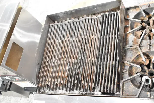 Prince Castle FHP48-2RB charbroiler with 4-burner range, natural gas, commercial-grade, shows visible wear.