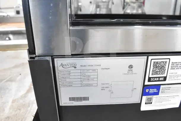 Brand new Avantco BCTD-48 48" curved glass bakery display case with LED lighting, model details and voltage label shown.