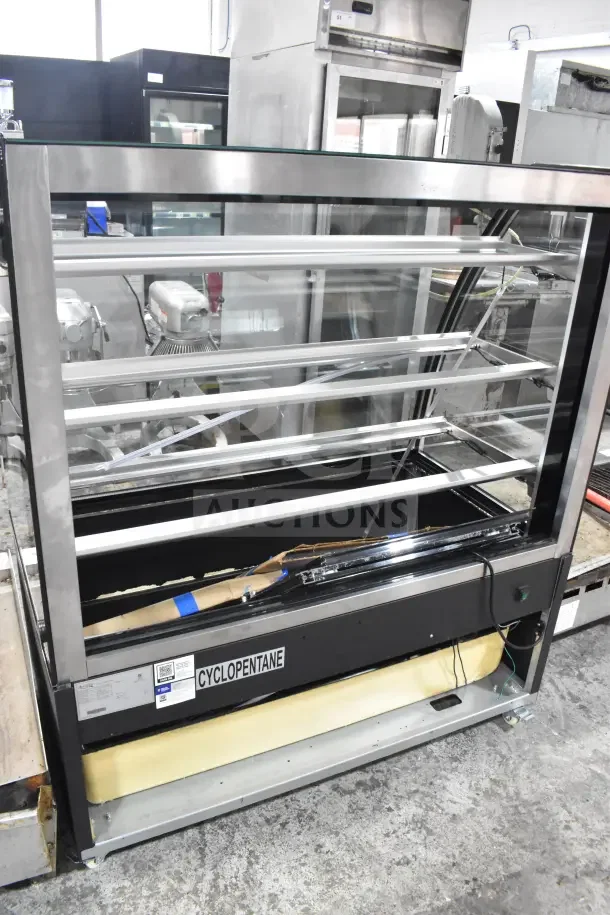 Brand new Avantco BCTD-48 bakery display case, 48" black, curved glass, 3-shelf, LED lighting, 115 volts, slight dents.