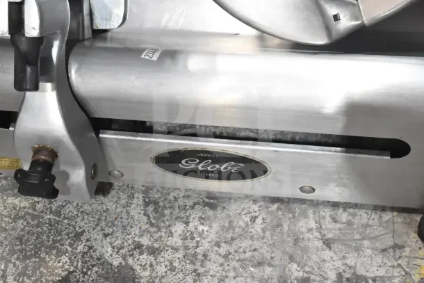 Globe 500 Commercial Countertop Meat Slicer, includes blade sharpener, 115 volts, 1 phase, shown with label "Gravity Feed".