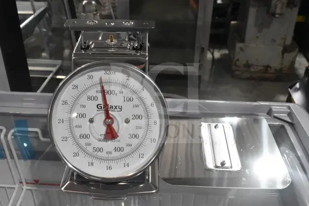 BRAND NEW Galaxy 177GPCM2 2 lb. mechanical portion control scale with scratch and dent. Clear dial, sturdy metal frame.