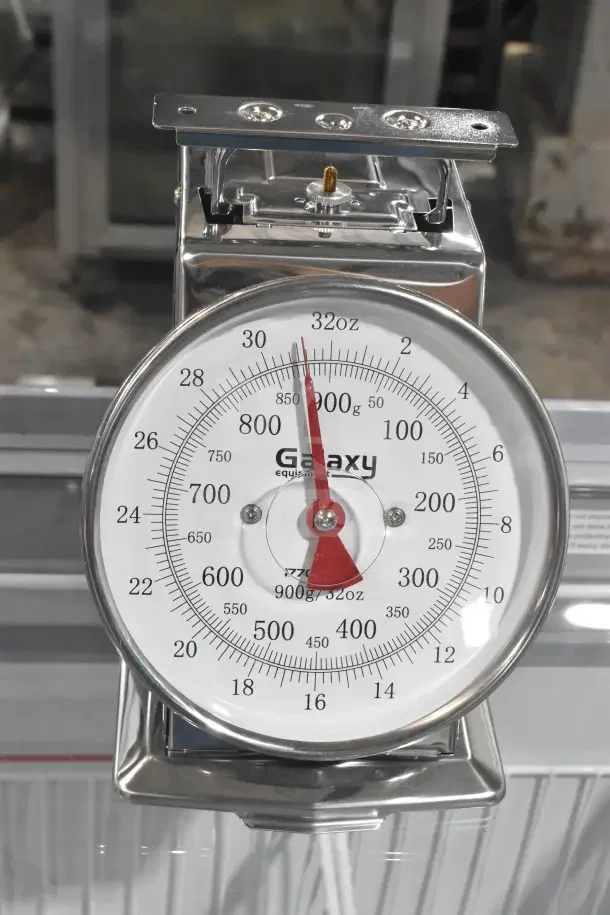 Brand new Galaxy 177GPCM2 2 lb. mechanical portion control scale, scratch and dent, stainless steel finish, precise measurement.