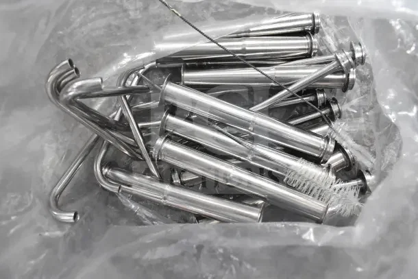 Bulk stainless steel pumps and cleaning brushes in plastic bag, suitable for server CPSS-F lids. Some signs of light wear.