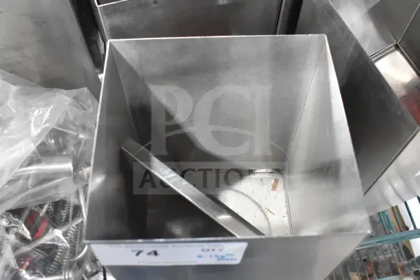 Stainless steel drop-in bin, part of 13-item lot including bins, CPSS-F lids, and pumps. Auction item, minimal wear.