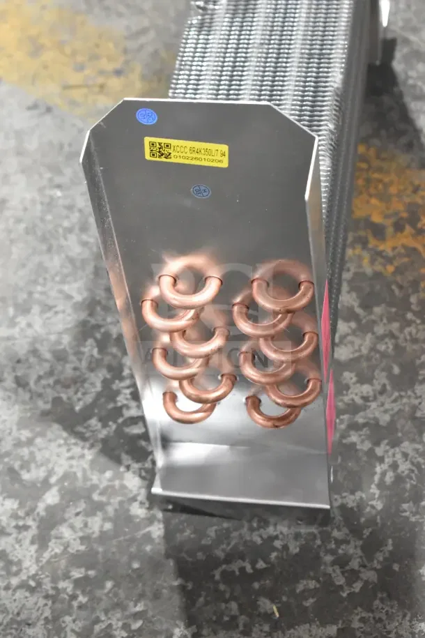 BRAND NEW SCRATCH AND DENT Avantco 17818766 Evaporator Coil for UDD and UBB Series, copper tubing, labeled "XCCC 6R4K350L7.94".