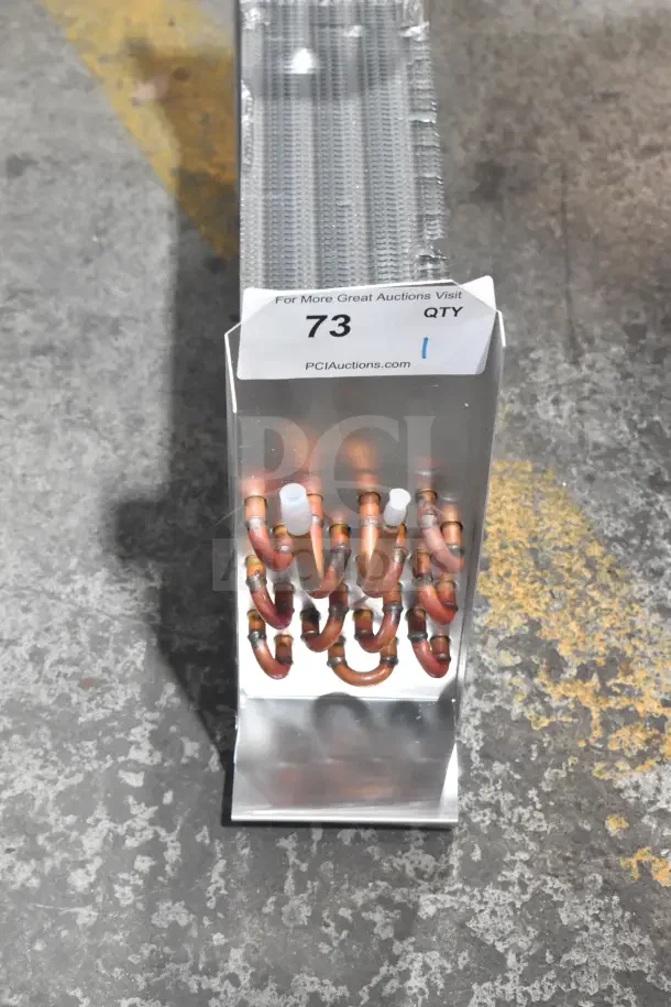BRAND NEW Avantco 17818766 evaporator coil for UDD and UBB series. Slight cosmetic scratches. Includes label "73" for auction.