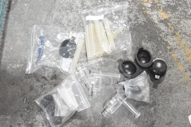 Seven-piece set with condiment bottles, pumps in bags; items appear unused with no visible wear.