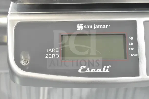 Brand new San Jamar Escali SCDGM66 digital portion control scale, 66 lb capacity, features tare function, visible slight scratches.