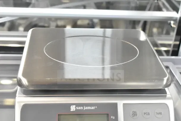 Brand new San Jamar / Escali SCDGM66 digital kitchen scale, 66 lb capacity, multi-function, with minor scratches.