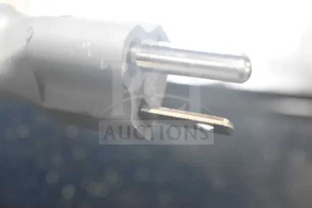 Close-up of a 120-volt power plug for Samsung ME11A7510DS Microwave Oven.