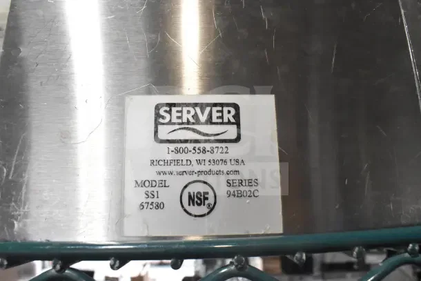 Close-up of a Server SS1 pump piece with a label showing model SS1, series 94B02C, in used condition.