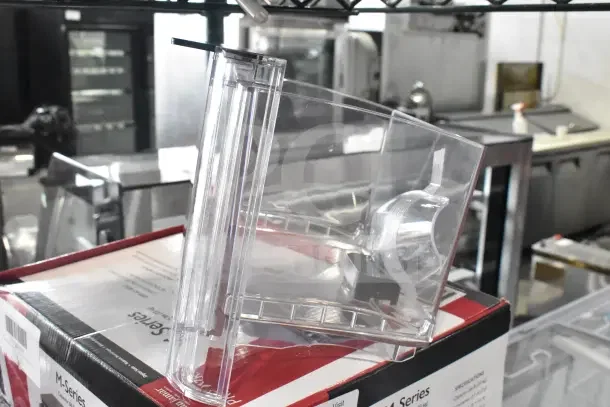 General Electric GE XPIO13SCBSS ice maker box with clear water reservoir. Model details visible on packaging.