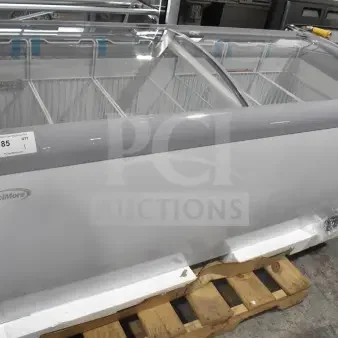 Brand new KoolMore MCF-20C ice cream display freezer, 20 cu. ft., scratch and dent, 115V, 1 Phase. Visible model label.