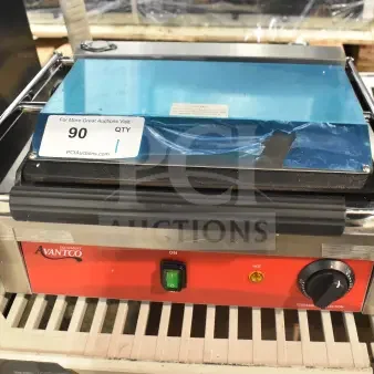 Brand new Avantco 177PG200S Panini Grill, smooth plates, 13 3/8" x 8 3/4" surface, 120V, with minor scratches.