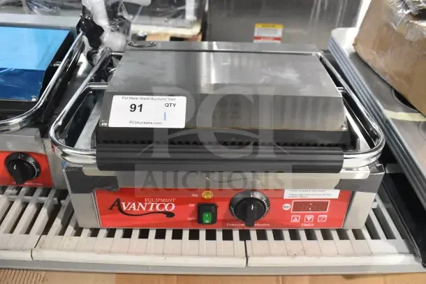 BRAND NEW Avantco 177PG200S Panini Grill, grooved top, smooth bottom, 13 3/8" x 8 3/4" cooking surface, 120V, with timer.