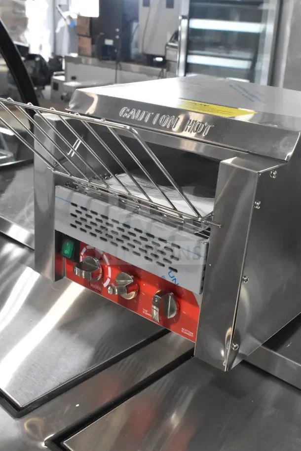 Brand new Avantco 184T3300B commercial conveyor toaster, 10" wide, 3" opening, red control panel, caution label visible.