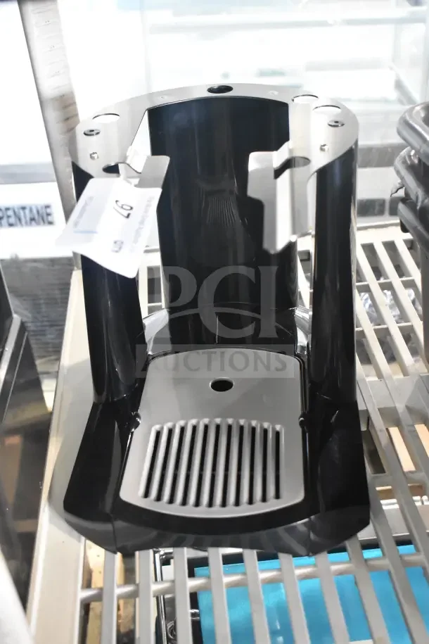 BRAND NEW Fetco A150 Black and Stainless Steel Coffee Server Stand, single unit; slight scratches visible.