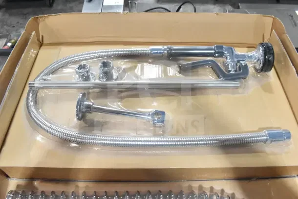 Brand new Regency 600PRW8X pre-rinse faucet by Fetco, 8" centers, 44" hose, 1.15 GPM, in packaging, some scratches.