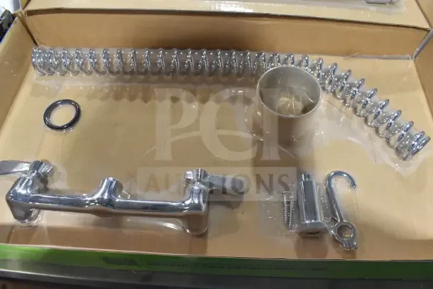 BRAND NEW SCRATCH AND DENT! Regency 600PRW8X wall-mounted pre-rinse faucet, 8" centers, 44" hose, Fetco make, in box.