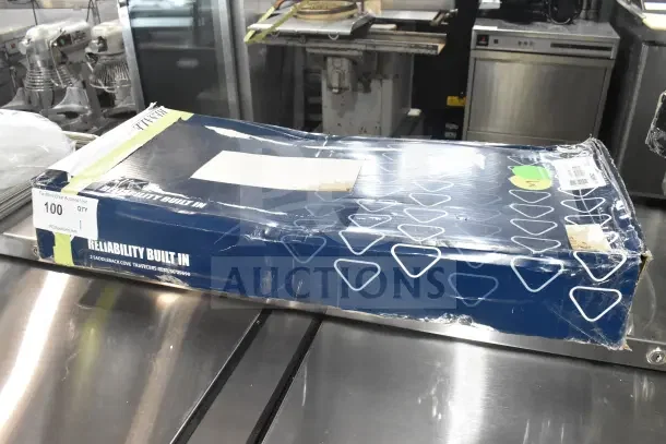 Box of Eversteel by T&S S-0113-BY stainless steel faucet and pre-rinse unit, new with visible scratch and dent.