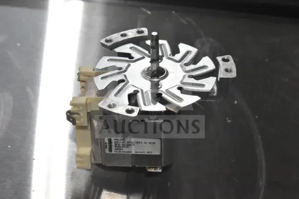 Fetco 242024K Motor Kit, 50/60Hz, brand new, stainless steel, label shows model and voltage details.