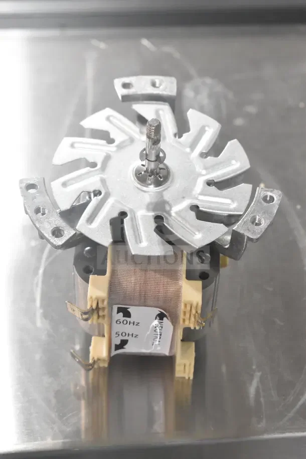 New Moffat M242024K motor kit, 50/60Hz. Features metal construction with frequency label visible, unused condition.