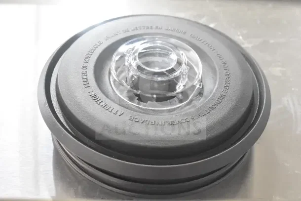Brand new AvaMix 928PLID2 blender jar lid, featuring secure gasket seal; durable black and clear design.
