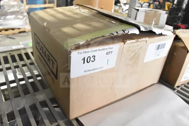 Box labeled "Hobart Genuine Parts" containing a brand new Vulcan French Plate, 480v. Auction info and quantity "1" marked.