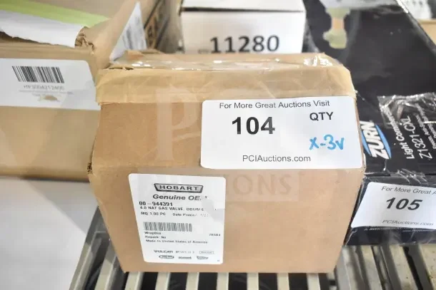 3 brand new scratch and dent items: Vulcan 00-944391 gas valve, 00-922203 valve Wp22k-2511-2, 00-856615-00001 pilot burner. Box labeled with item and model details.