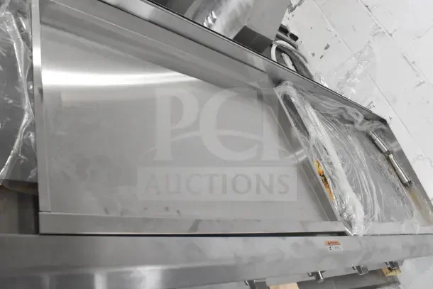 Brand new Cooking Performance Group GM-CPG-72-NL gas griddle, 72" wide, manual controls, 180,000 BTU, minor scratches.