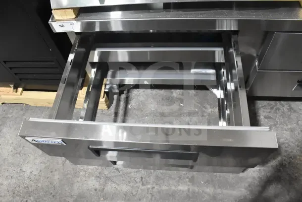 Brand new Avantco 178CBE72HC 4-drawer chef base, 115V, scratch and dent, stainless steel, visible logo, open drawer view.