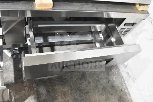 Alt text: Avantco 178CBE72HC Commercial Chef Base with 4 drawers, brand new with slight dents, 115 volts, 1 phase.