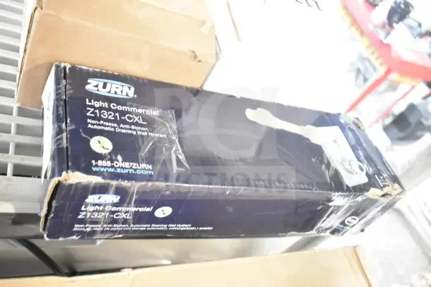 Zurn Elkay Z1321-CXL-10 Ecolotrol 10" Wall Hydrant, new, in scratched box, non-freeze, anti-siphon features visible.