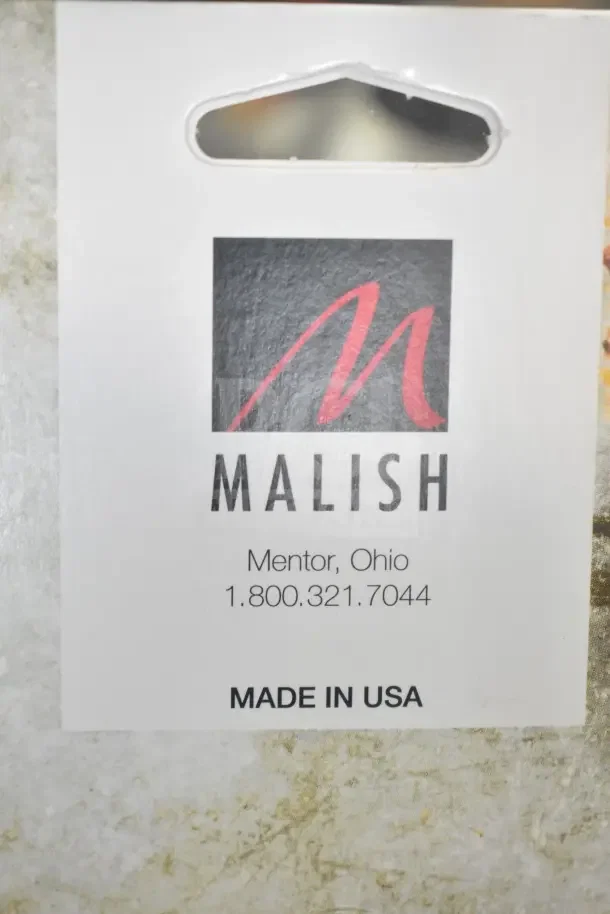 Malish UGB Ultimate Grill Brush packaging, brand new with visible "Made in USA" label and contact details for Malish in Mentor, Ohio.