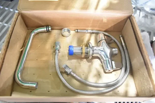 Brand new 5105F2SLX08 Equip T&S single hole faucet with 8 1/8" swing nozzle, lever handles, in original packaging.