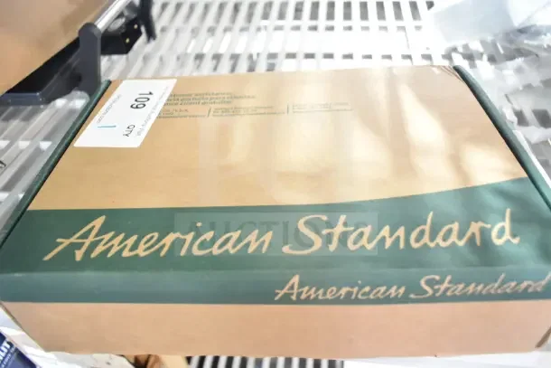 Brand new American Standard Ultima urinal flush valve, model 6045051.002, 0.5 GPF, in original packaging, scratch and dent condition.