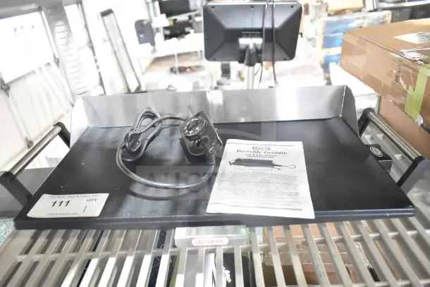BRAND NEW Cadco PCG-10C electric griddle, 21" x 12", 1,500W, 120V, light-duty, scratch and dent condition, with manual.