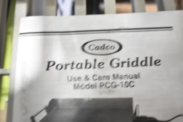 BRAND NEW SCRATCH AND DENT Cadco PCG-10C electric griddle, 21"x12", 1,500W, 120V, includes manual, light-duty use.