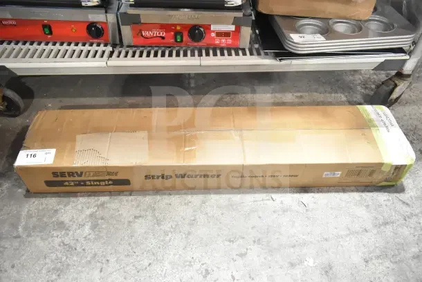 Brand new ServIt 42" strip warmer in box, model 423SW42THA, single toggle control, 120V, 1 phase, scratch and dent condition.